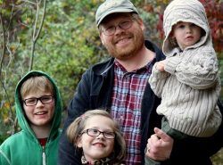 Jason Heinrich with niece, two nephews