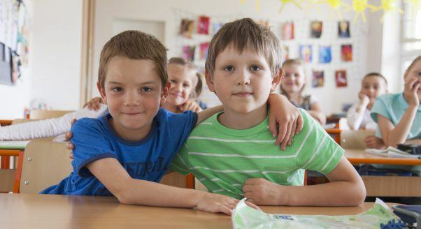 two young boys in schoolroom