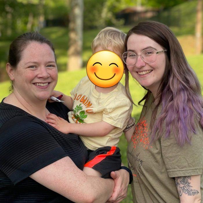 Molly Russell left and Shelbi Perdue smile together at a park