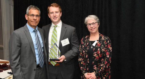 Spilman Thomas & Battle accept 2022 Distinguished Pro Bono Award from Legal Aid Executive Director Adrienne Worthy