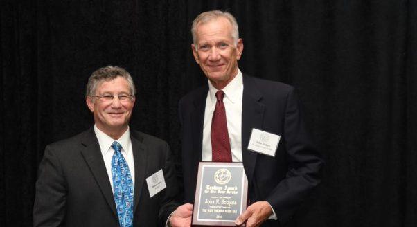 John Hedges accepts the 2022 Kaufman Award