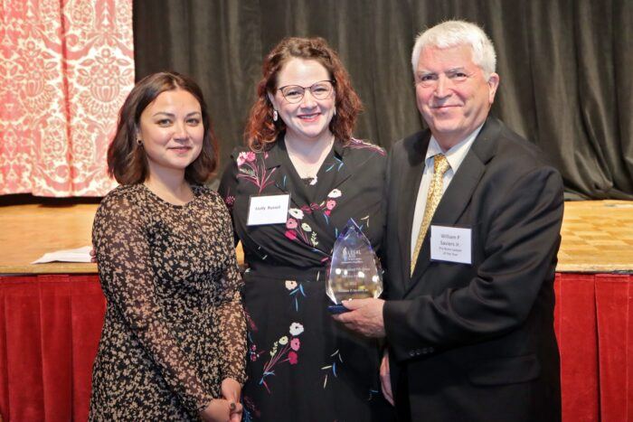 William P. Saviers, Jr. (right) accepts the Distinguished Pro Bono Award from Molly Russell (center) and Maria Borror (left), of Legal Aid of West Virginia.