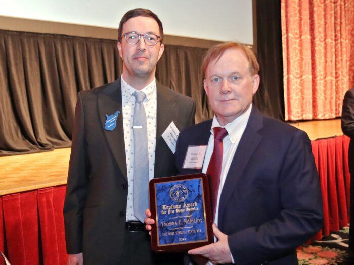 Benjamin Mishoe of WV State Bar, stands with Kaufman Award winner Thomas E. McIntire 