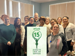 Legal aid ATLAS intake staff pose for a group photo