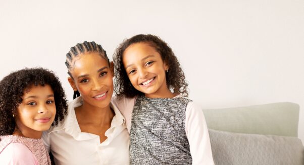 young woman with two young girls